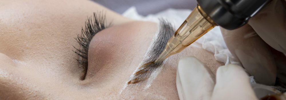beautician-doing-microblading-procedure-client-s-eyebrows