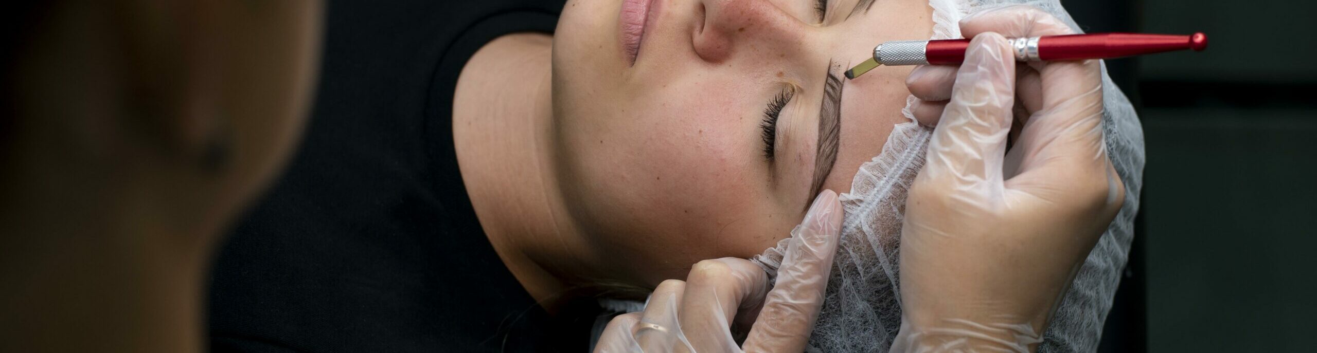 beautician-doing-microblading-procedure-woman-beauty-salon